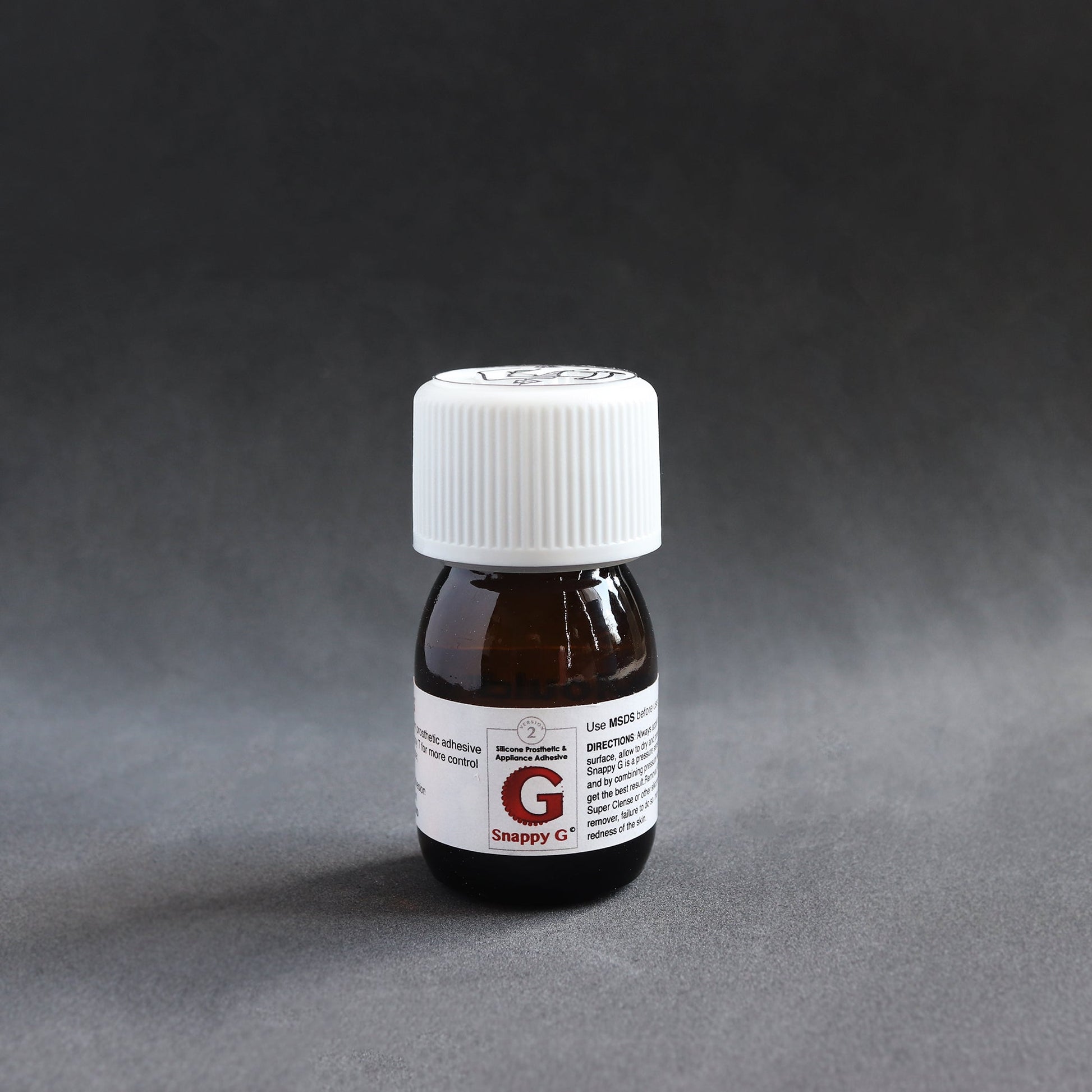 Bottle of Snappy G II (Silicone adhesive)