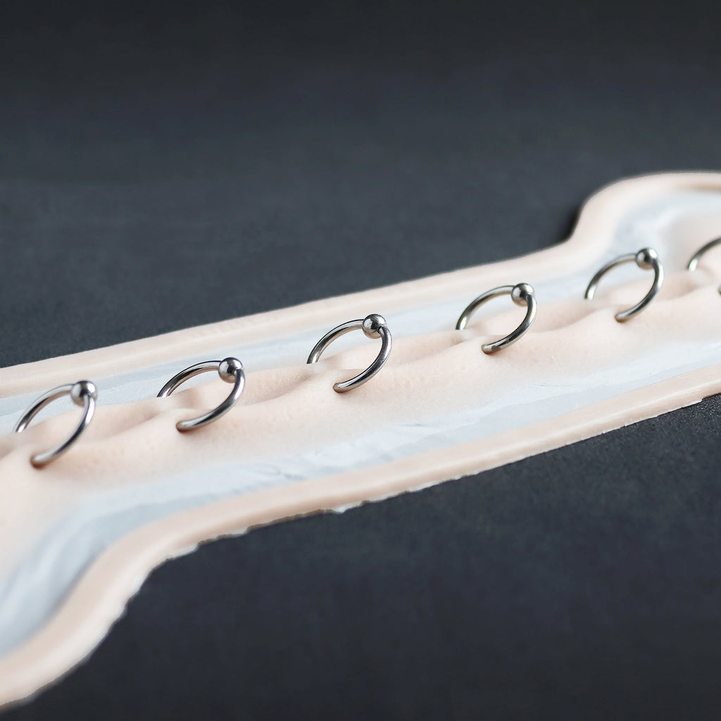 Pinched Corset Piercing - Meduusat Studio