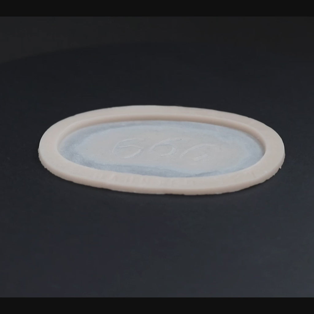 Small 666 prosthetic slowly revolving. 