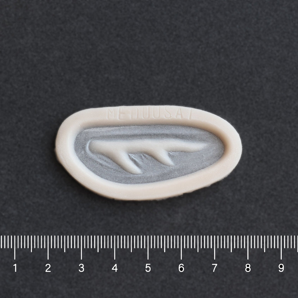 Antler Scar - Silicone makeup prosthetic in vanilla shade on a black surface