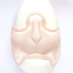 Bunny Nose - Silicone makeup prosthetic in vanilla shade on a white surface