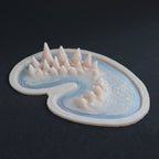 Dragon Half Face - Silicone makeup prosthetic in vanilla shade on a black surface