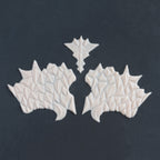 Facial Scales 2.0 - Silicone makeup prosthetic in vanilla shade on a black surface