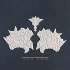 Facial Scales 2.0 - Silicone makeup prosthetic in vanilla shade on a black surface with a ruler