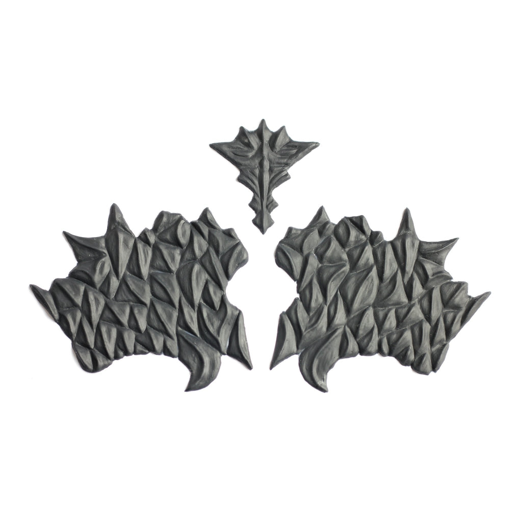 Facial Scales 2.0 - Silicone makeup prosthetic in black on a white surface