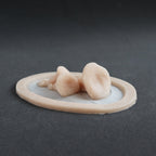 Fungi - Silicone makeup prosthetic in vanilla shade on a black surface