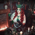 Woman with red hair wearing fungi prosthetics on her face