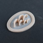 Horizontal Bracket Fungi - Silicone makeup prosthetic in vanilla shade on a black surface