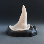 House Elf Nose - Silicone makeup prosthetic in vanilla shade on a black surface