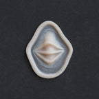 Nose Bridge Ridges - Silicone makeup prosthetic in vanilla shade on a black surface