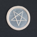 Pentagram Scarification - Silicone makeup prosthetic in vanilla shade on a black surface