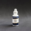 Small bottle of Pros-Aide (Acrylic adhesive)