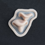 Resinous Polypore Mushrooms - Silicone makeup prosthetic in vanilla shade on a black surface