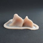 Resinous Polypore Mushrooms - Silicone makeup prosthetic in vanilla shade on a black surface