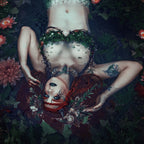 Mermaid with red hair wearing ruffle gills