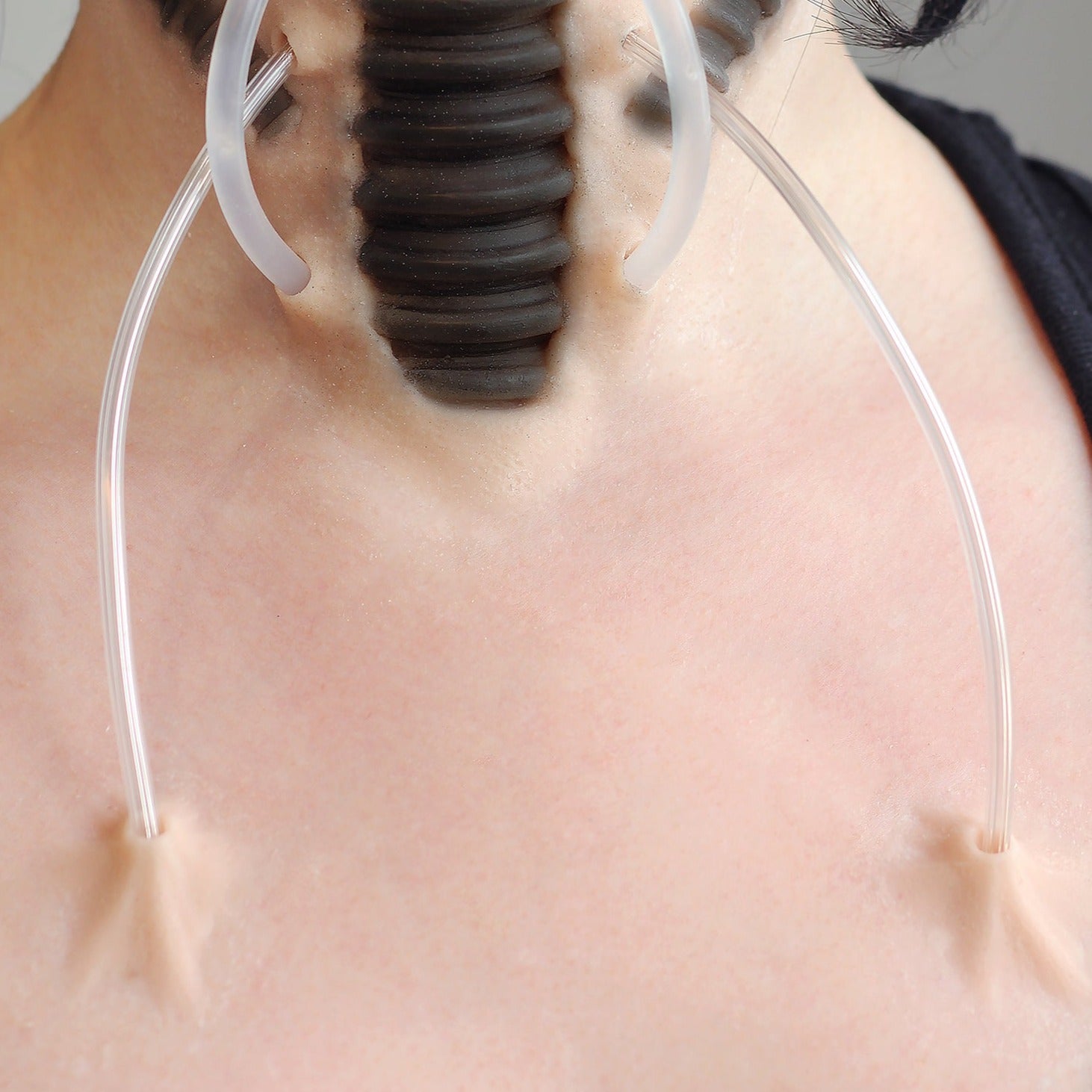 Woman wearing skin pocket 2 prosthetics on her chest