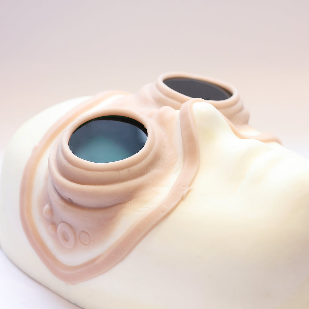 Steampunk Goggles - Silicone makeup prosthetic in vanilla shade on a white surface