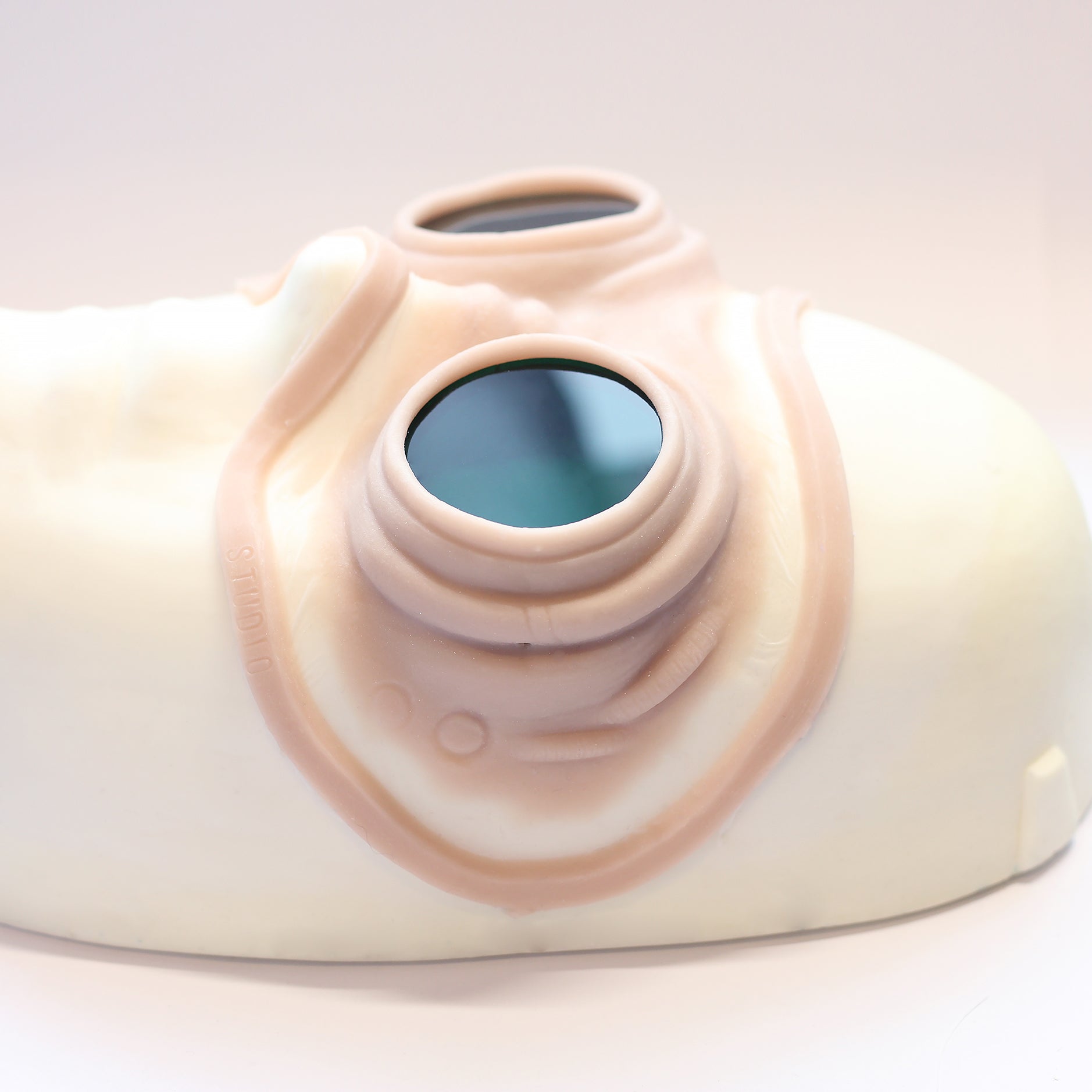 Steampunk Goggles - Silicone makeup prosthetic in vanilla shade on a white surface