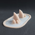 Triple Devil Horns - Silicone makeup prosthetic in vanilla shade on a black surface